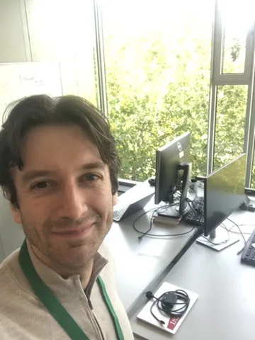 Nikola Selic working from an office at CWI in Amsterdam